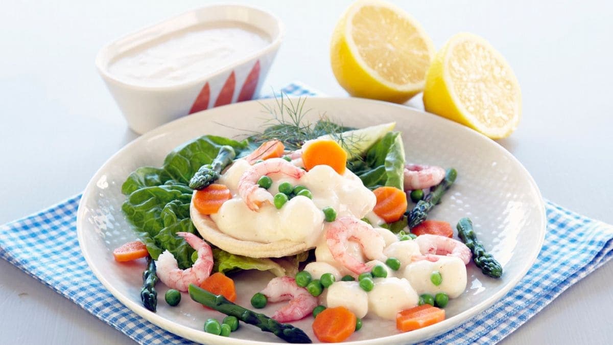 Terteskjell med fiskepudding i hvit saus