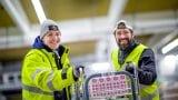 To glade medarbeidere på TINE Lager.