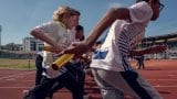 Barn løper på Bislett stadion under TINEstafetten sitt 25 årsjubileum i 2018