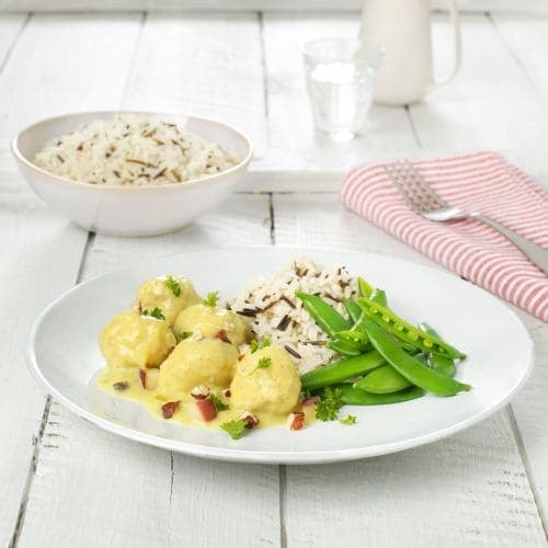 Svinekjøttboller i karrisaus