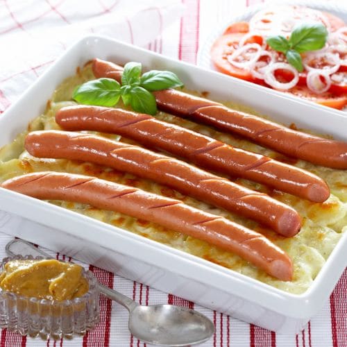 Pølse i brød med godt tilbehør
